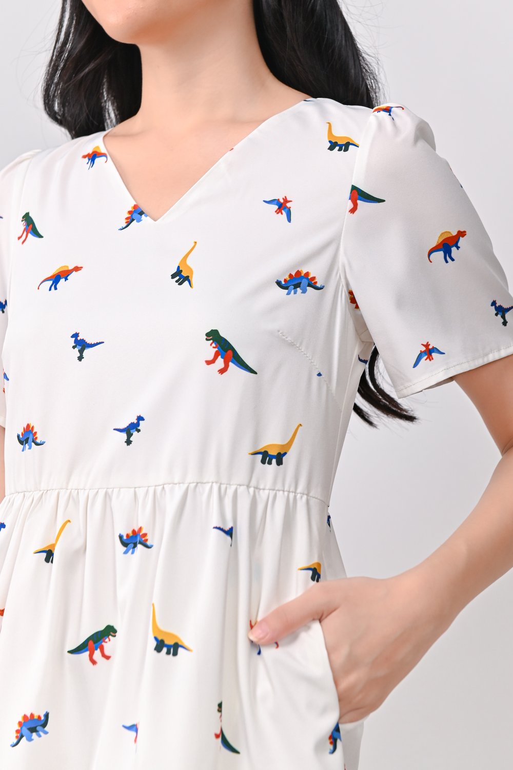 DINO PRINTED BABYDOLL DRESS IN WHITE DINO PRINTED BABYDOLL DRESS IN WHITE
