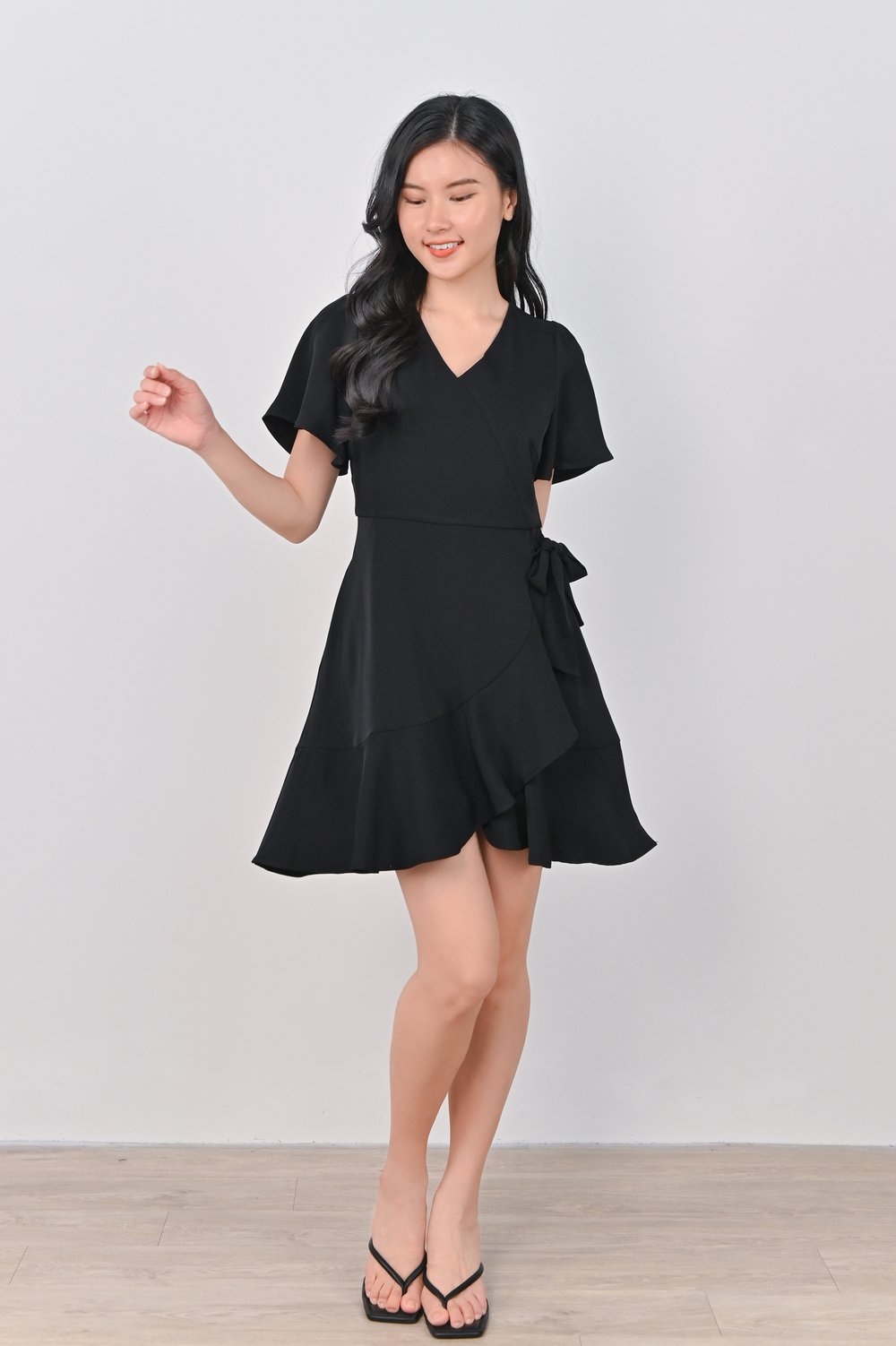 DION RUFFLE DRESS-ROMPER IN BLACK