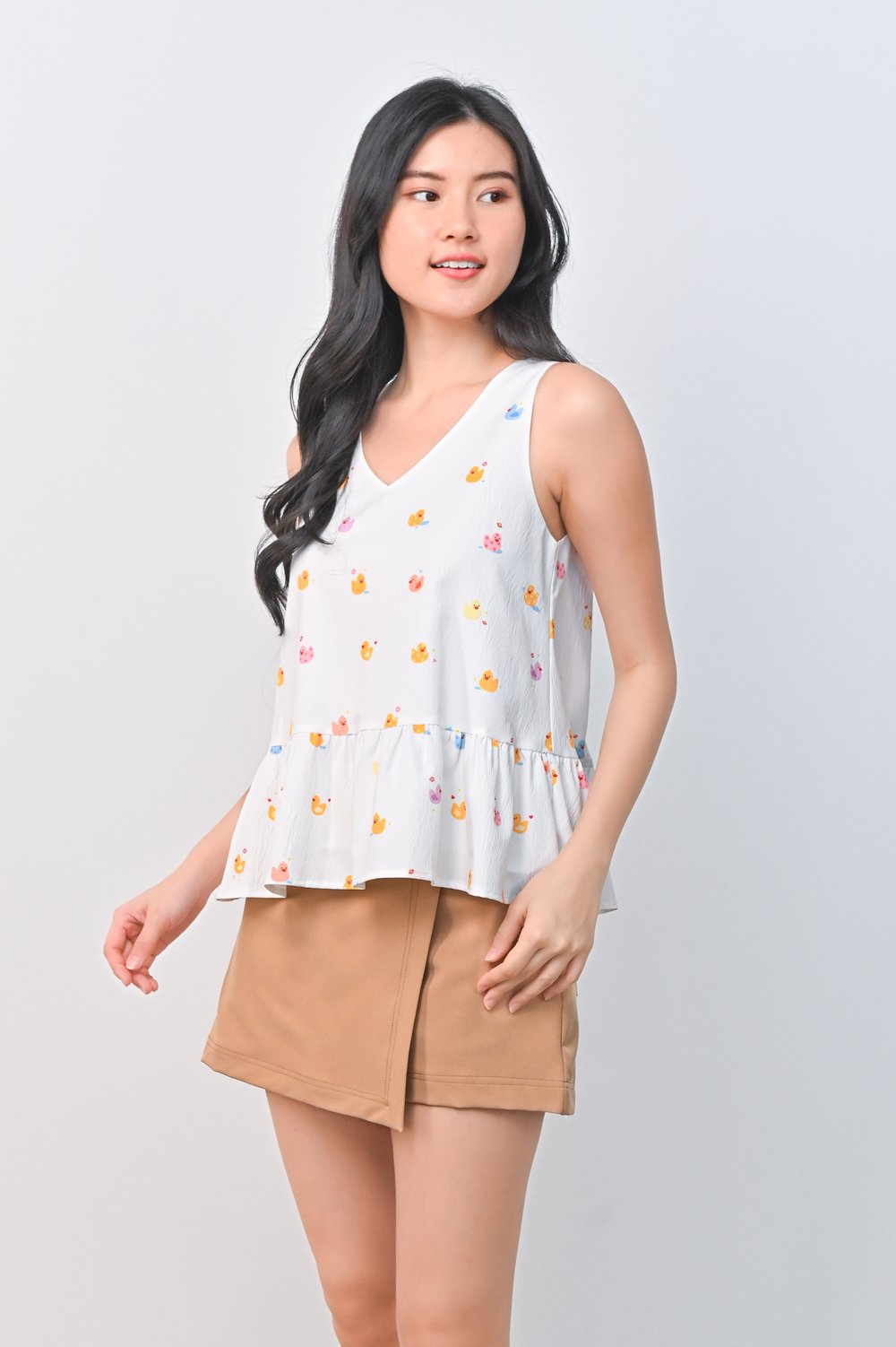 RUBBER DUCKIE WHITE PEPLUM TOP RUBBER DUCKIE WHITE PEPLUM TOP