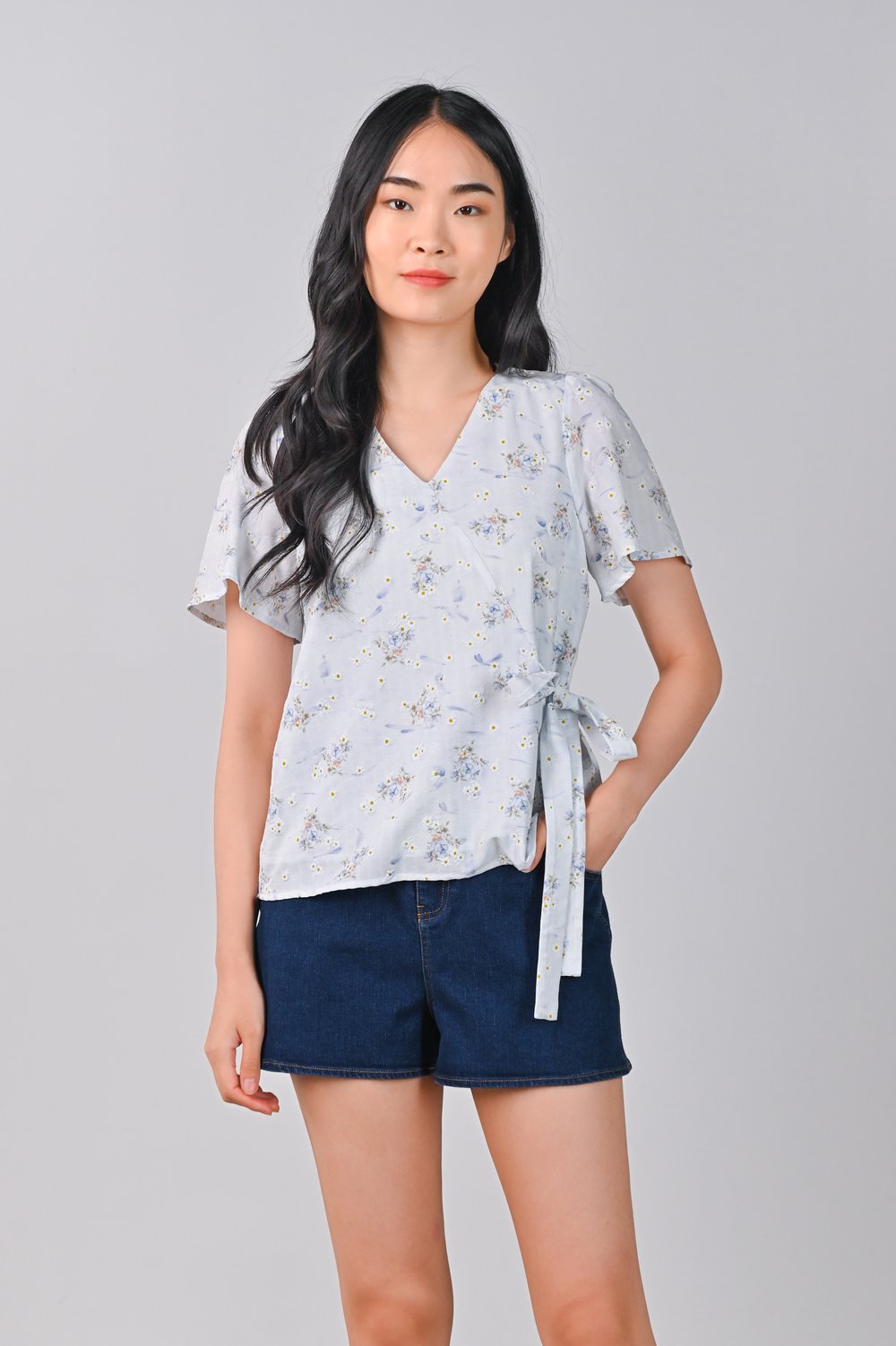 RINA FLORAL SLEEVED TIE-SASH TOP IN BLUE