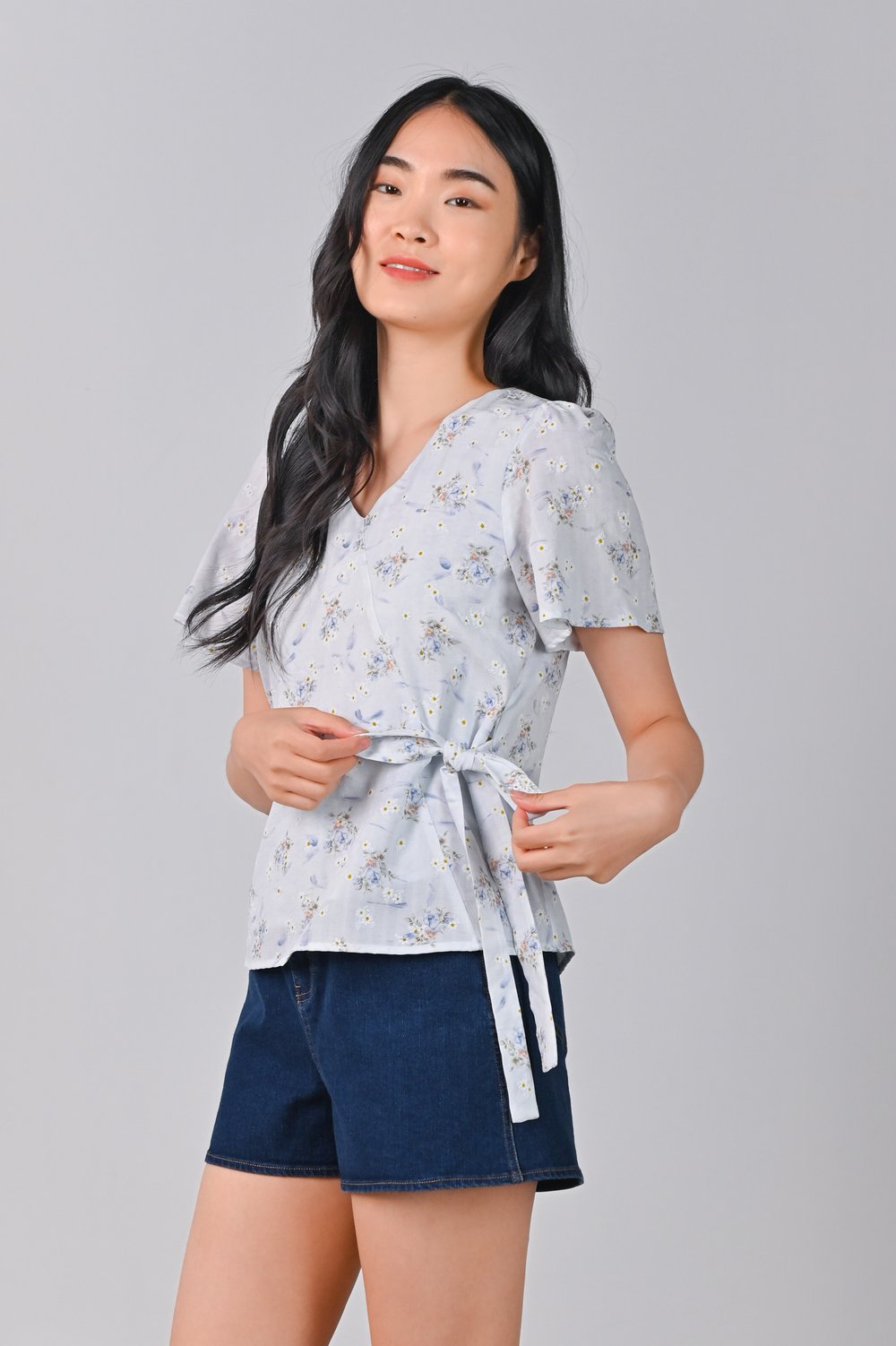 RINA FLORAL SLEEVED TIE-SASH TOP IN BLUE