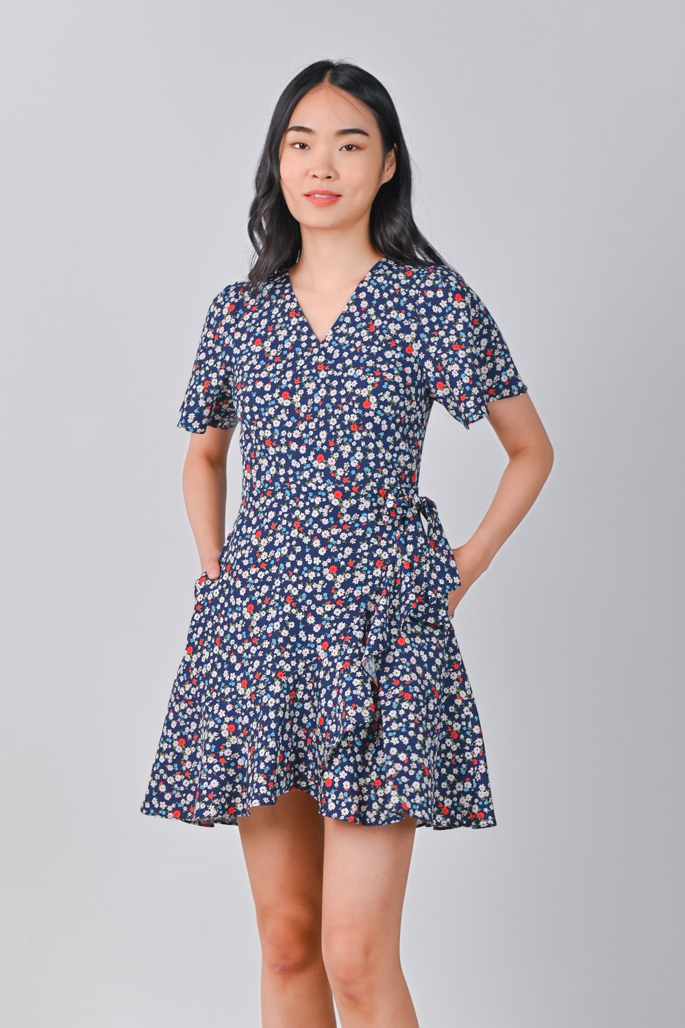COOPER RUFFLE DRESS-ROMPER IN BLUE FLORAL COOPER RUFFLE DRESS-ROMPER IN BLUE FLORAL