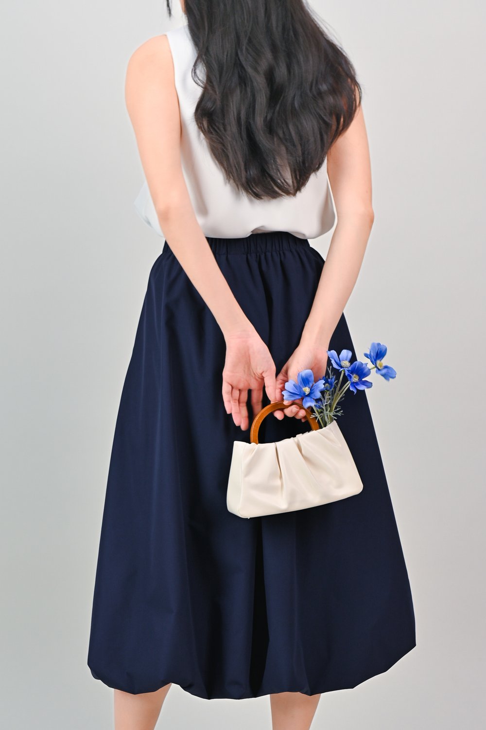 BUBLE BUBBLE MIDI SKIRT IN NAVY