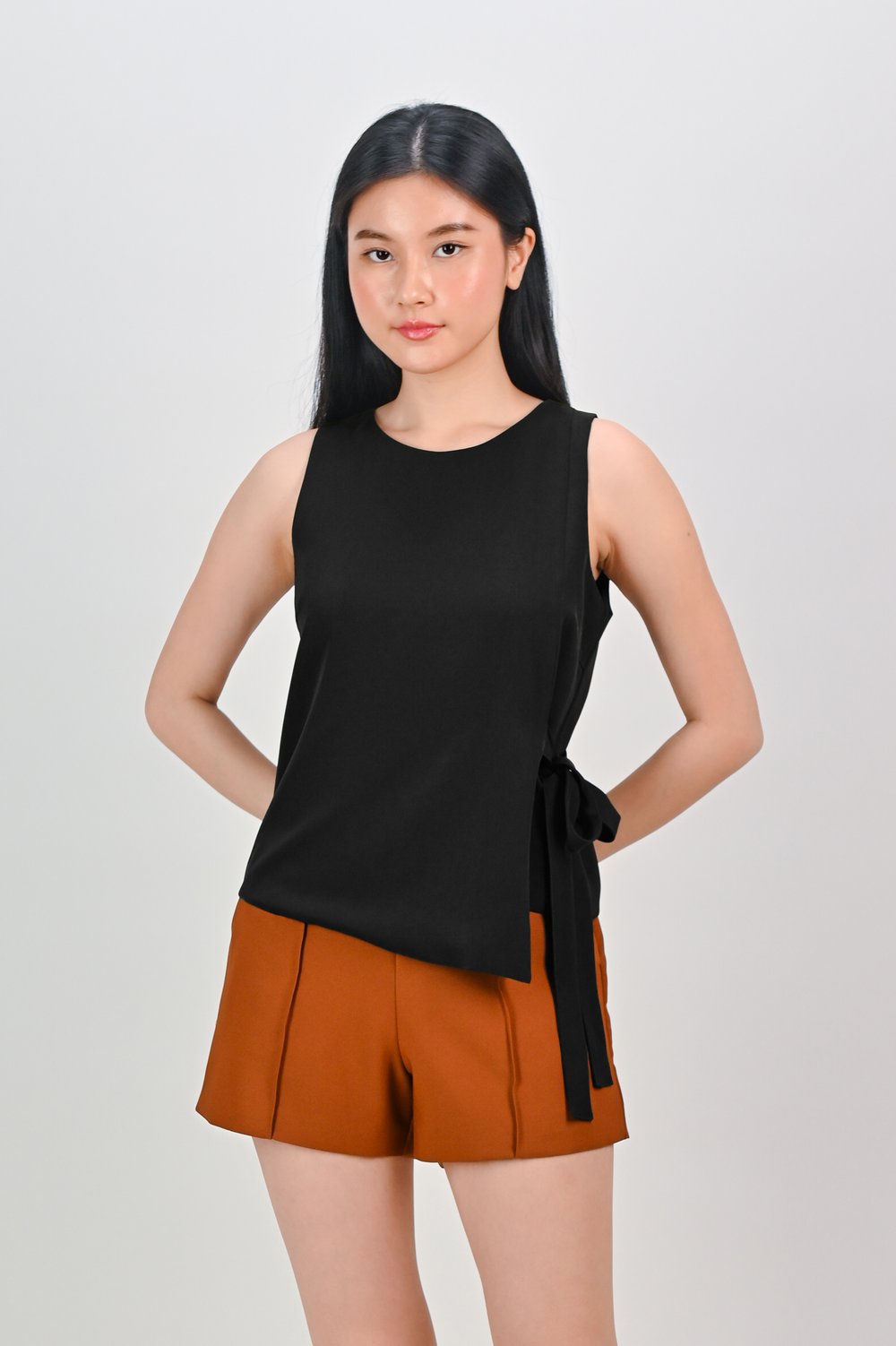 NADIA SLEEVELESS SIDE-TIE TOP IN BLACK