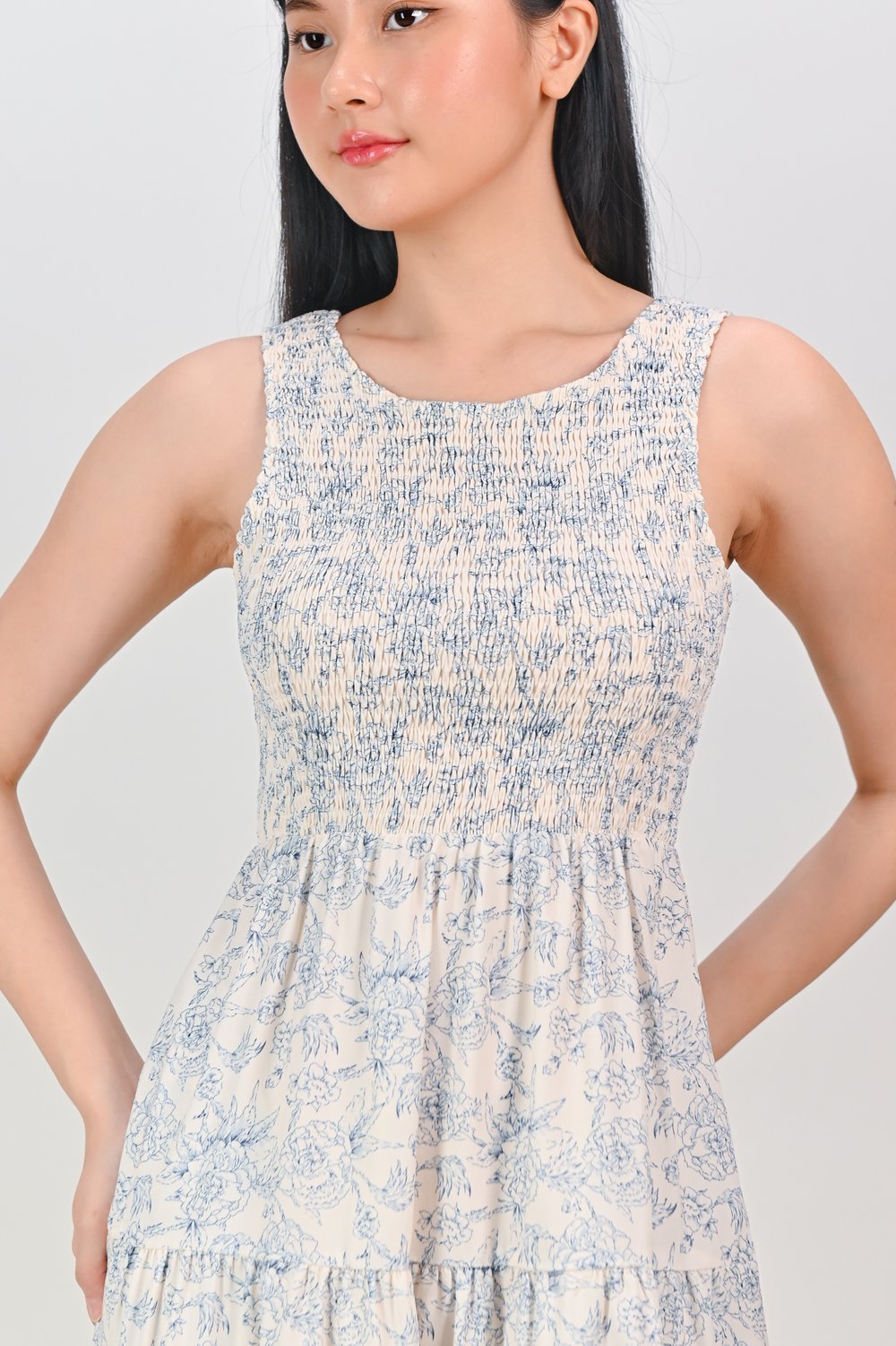 WAVERLY SLEEVELESS SMOCKED DRESS IN BLUE FLORAL