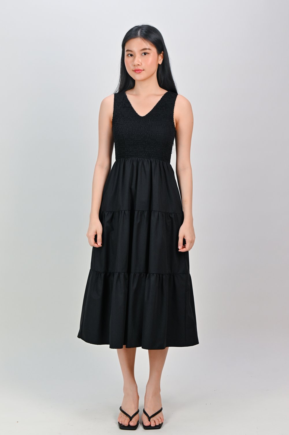 WAVERLY SLEEVELESS SMOCKED DRESS IN BLACK