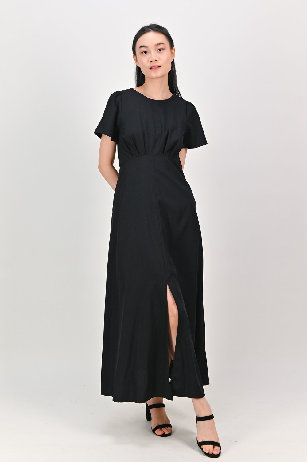 PANELLE CURVED-WAIST SLIT MAXI DRESS IN BLACK