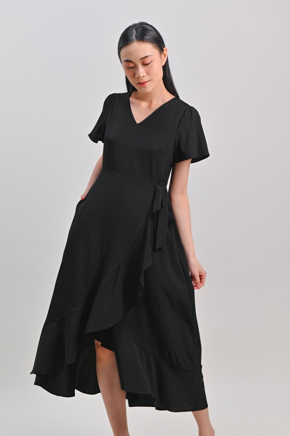 ROISIN SLEEVED FAUX-WRAP RUFFLE DRESS IN BLACK