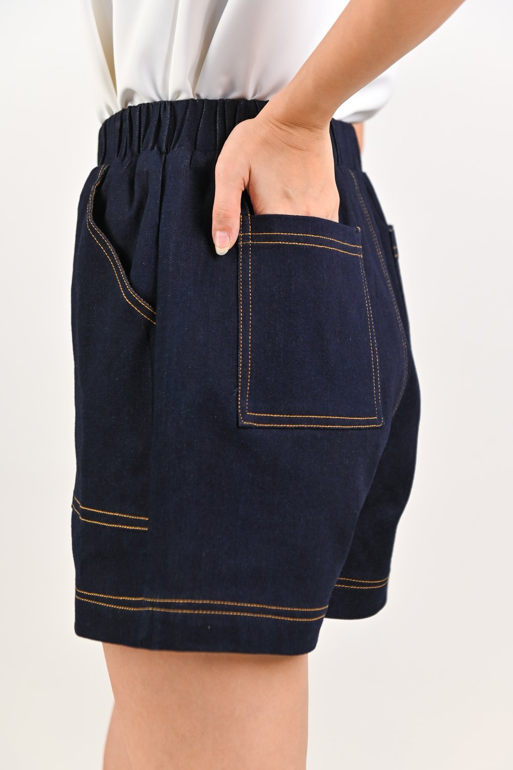 ZORANA ELASTIC-WAIST SHORTS IN DARK DENIM ZORANA ELASTIC-WAIST SHORTS IN DARK DENIM