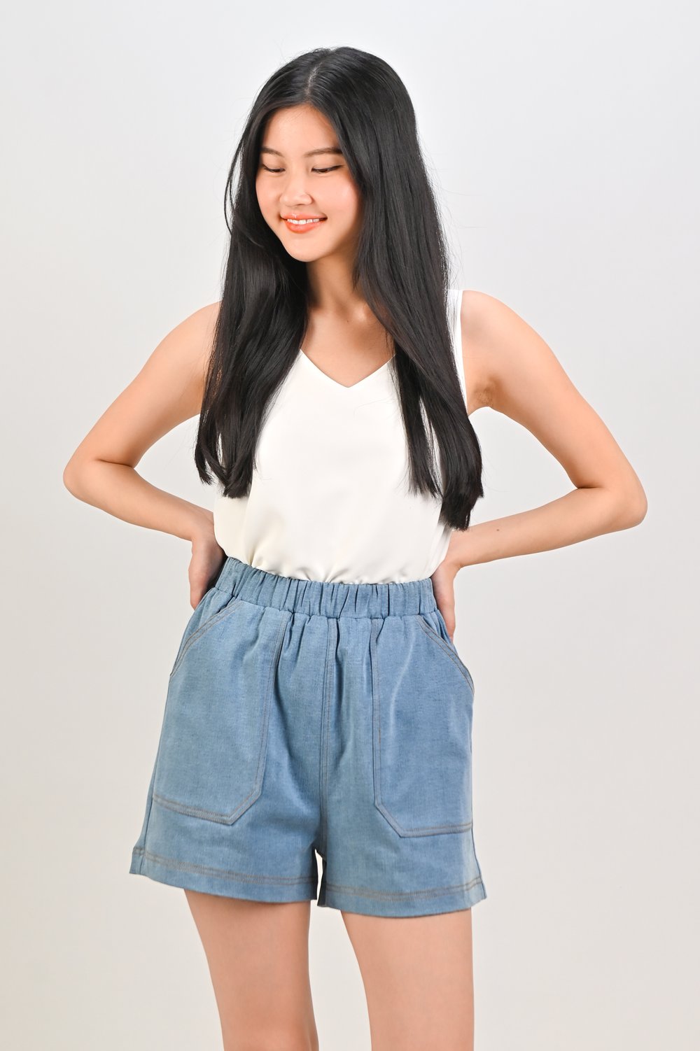 ZORANA ELASTIC-WAIST SHORTS IN LIGHT DENIM ZORANA ELASTIC-WAIST SHORTS IN LIGHT DENIM
