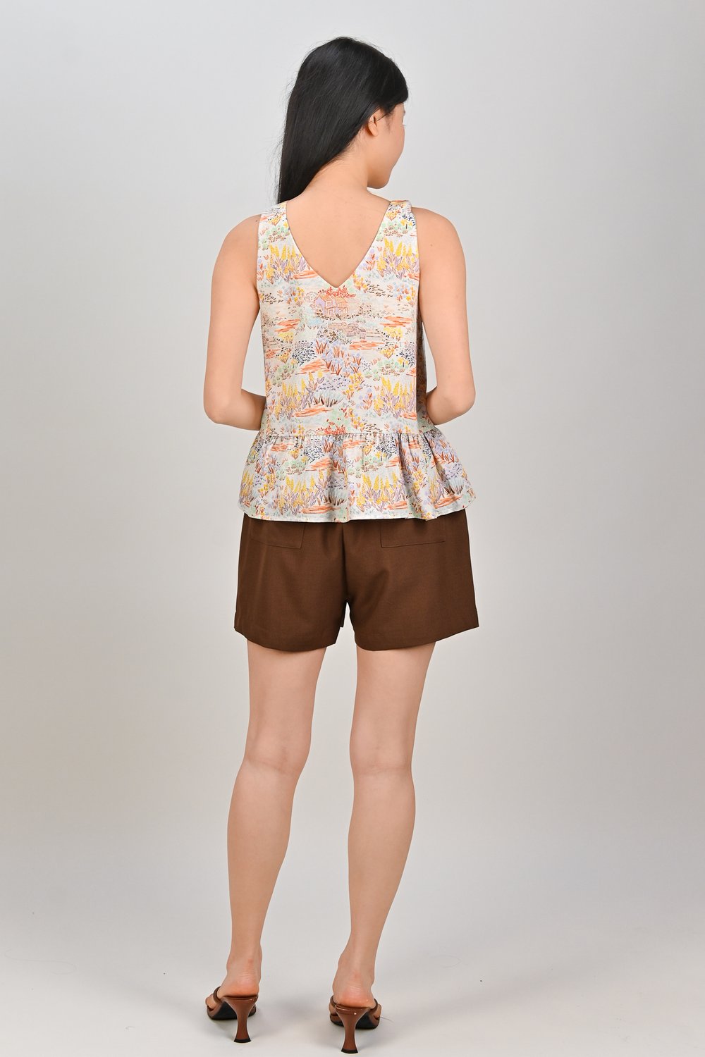 ORANGE COTTAGE SLEEVELESS PEPLUM TOP
