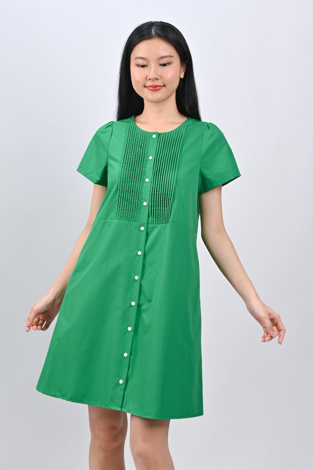 OPHYRA PINTUCK BABYDOLL DRESS IN GREEN