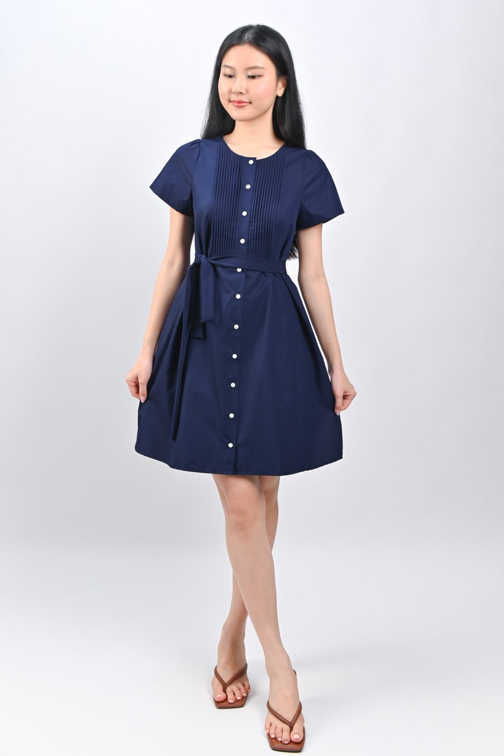 OPHYRA PINTUCK BABYDOLL DRESS IN NAVY
