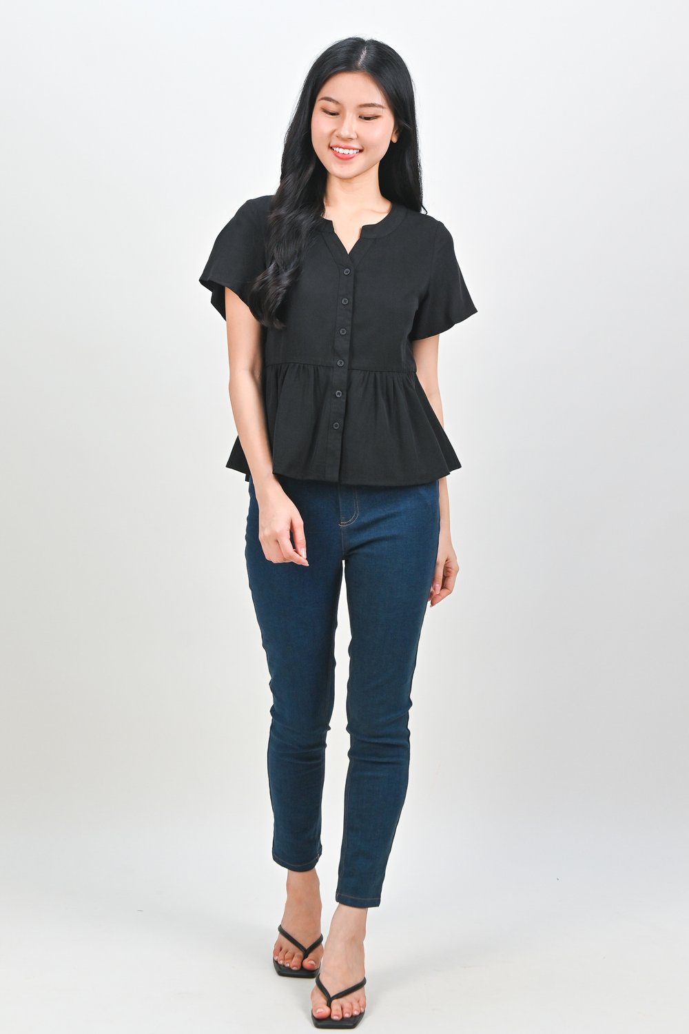NEMIRA NOTCHED-NECK PEPLUM TOP IN BLACK