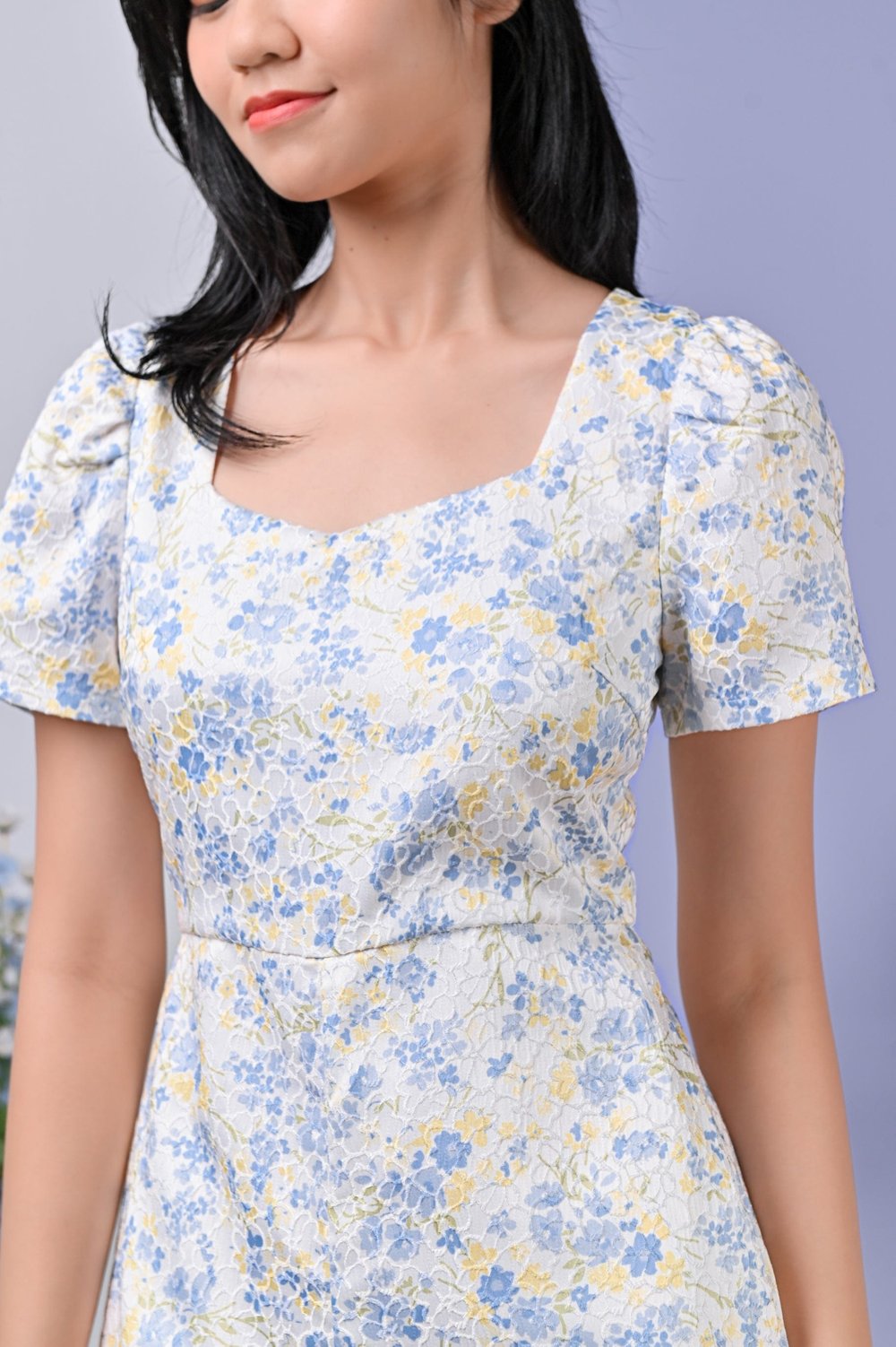 CASSIE EMBOSSED FLORAL ROMPER IN BLUE CASSIE EMBOSSED FLORAL ROMPER IN BLUE