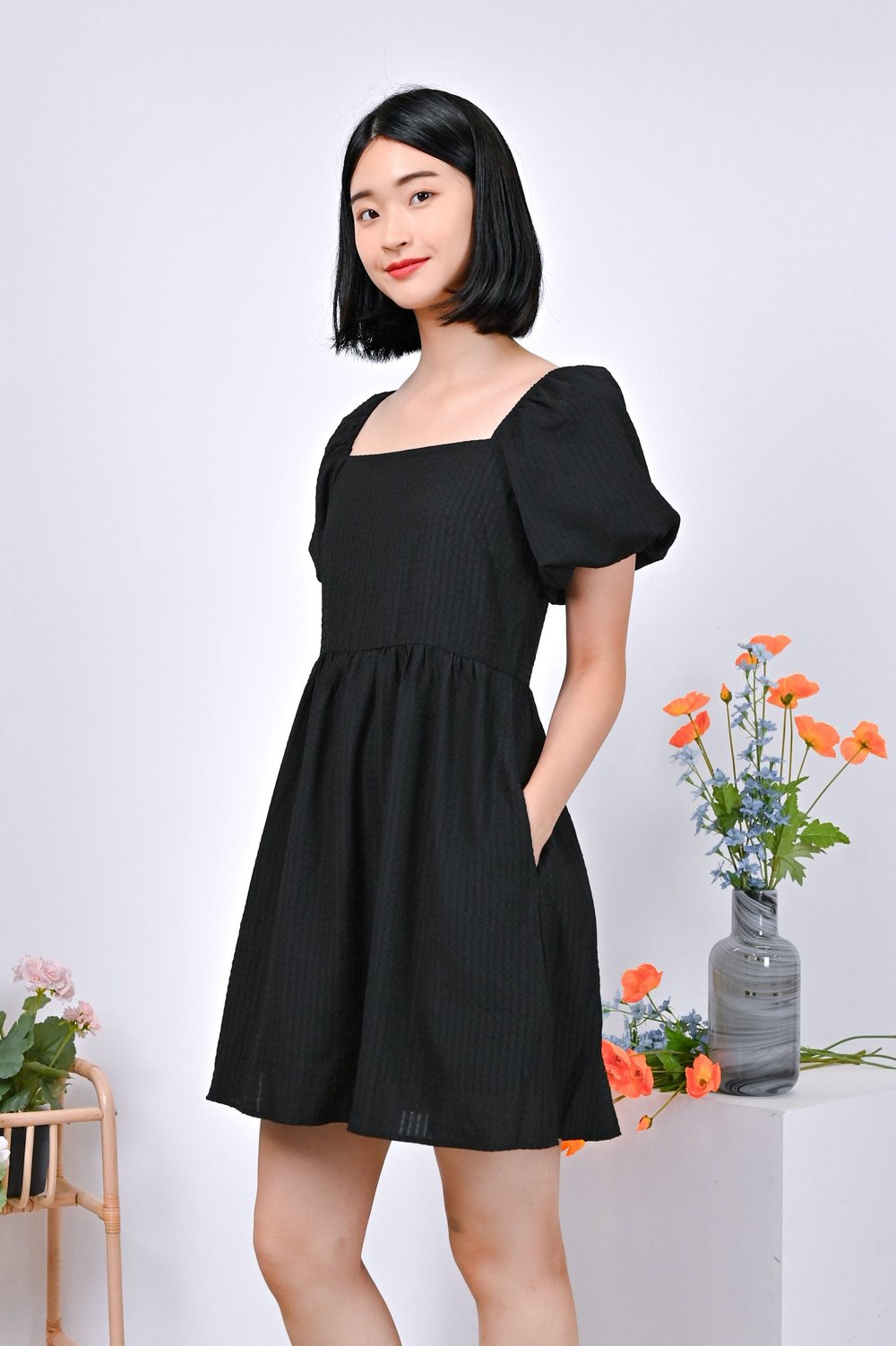 ESTRELLA TEXTURED DRESS-ROMPER IN BLACK