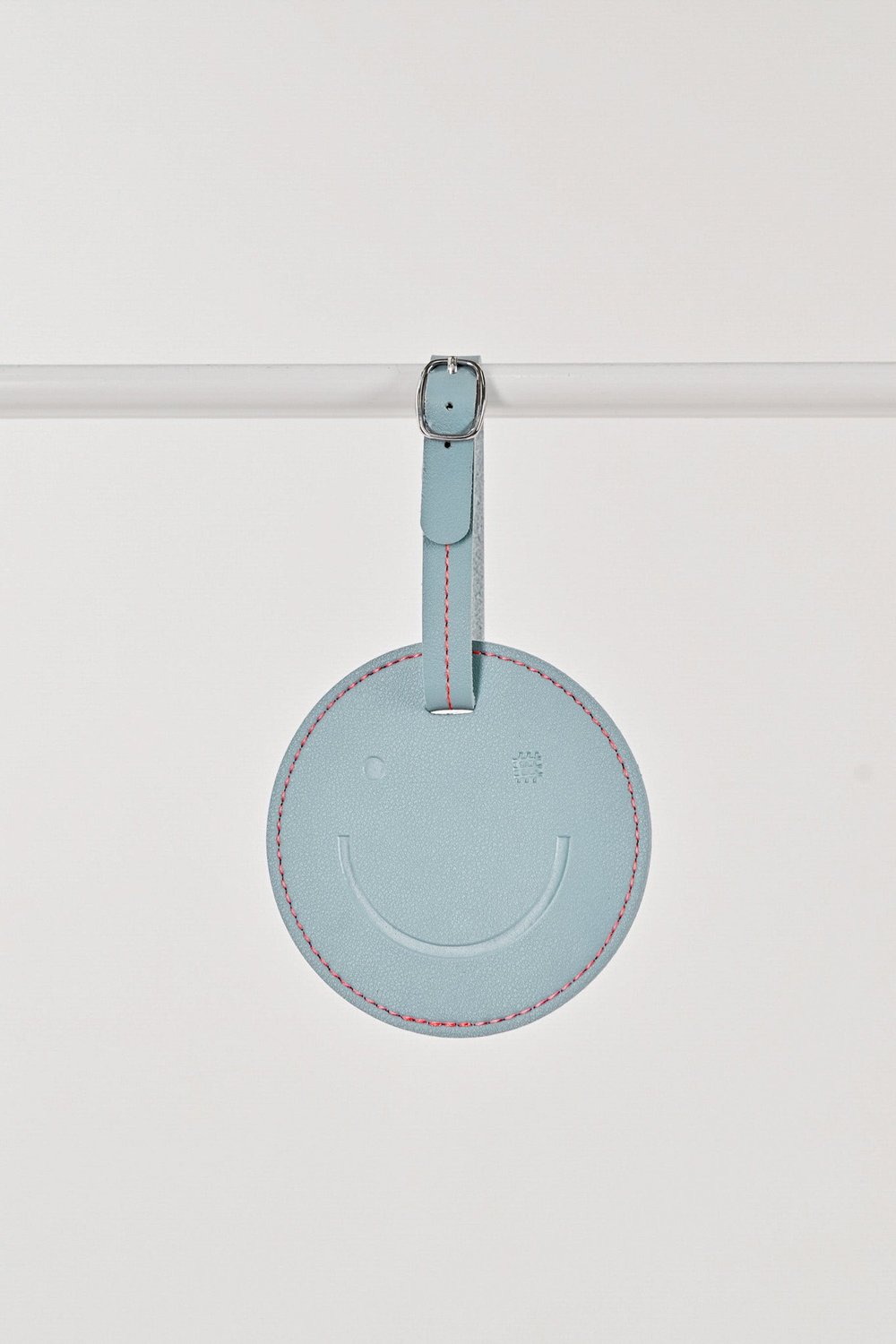 AWE SMILES LUGGAGE TAG IN DUSTY BLUE