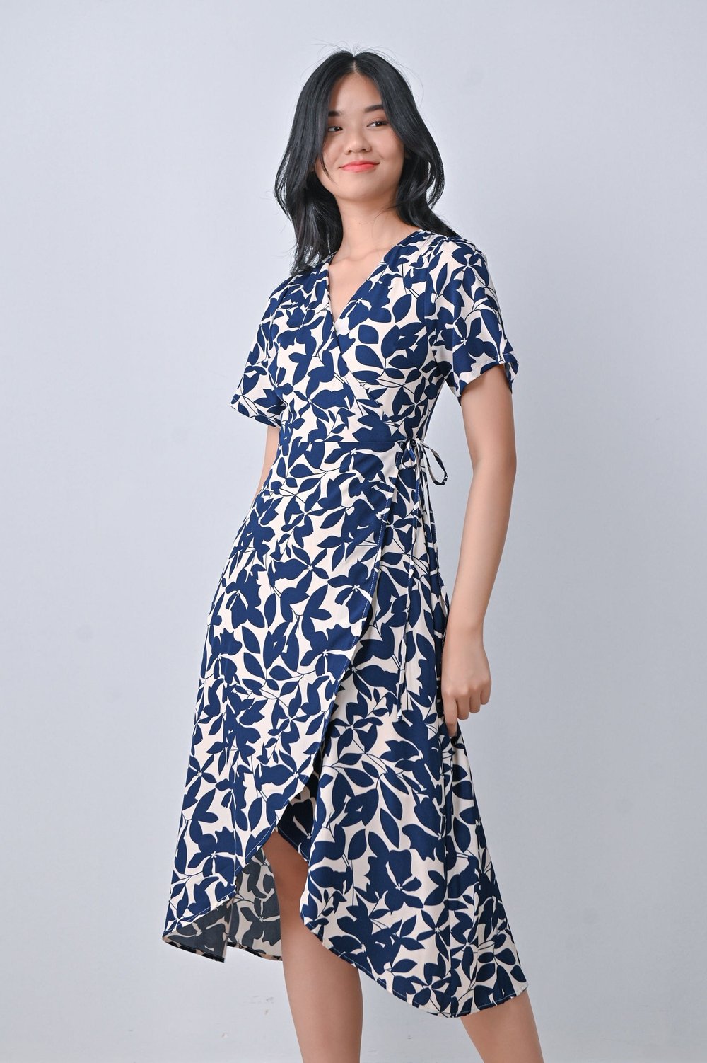 MIRANDA DIP-HEM WRAP DRESS