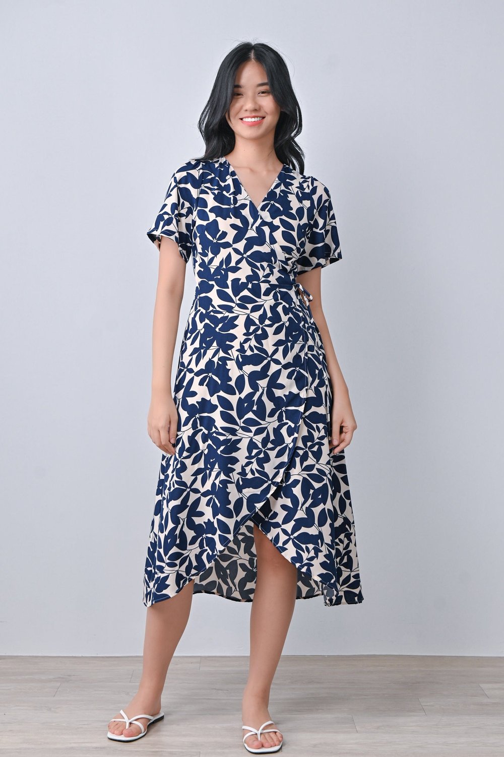 MIRANDA DIP-HEM WRAP DRESS