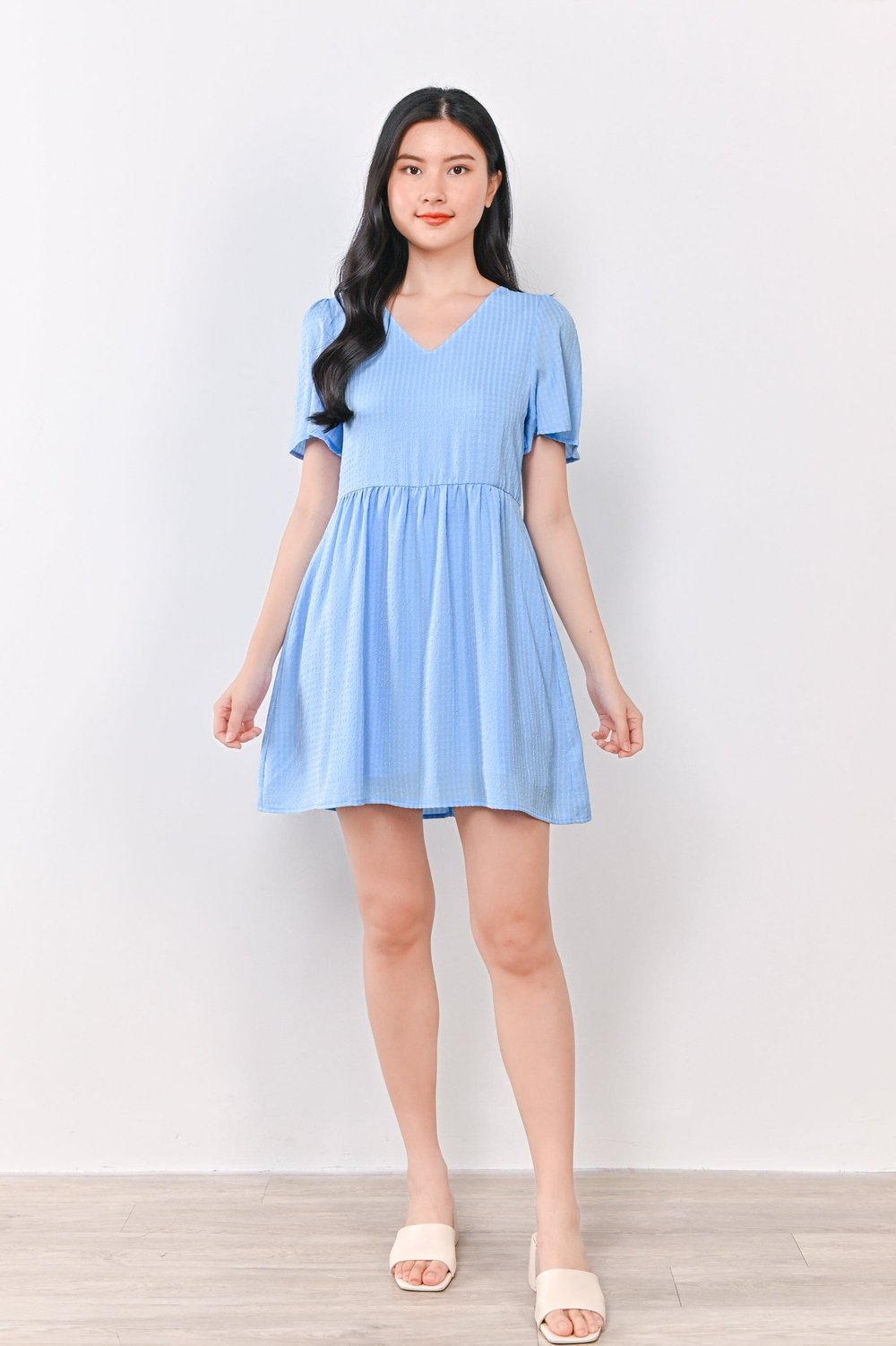 AMBER TEXTURED DRESS-ROMPER IN BLUE