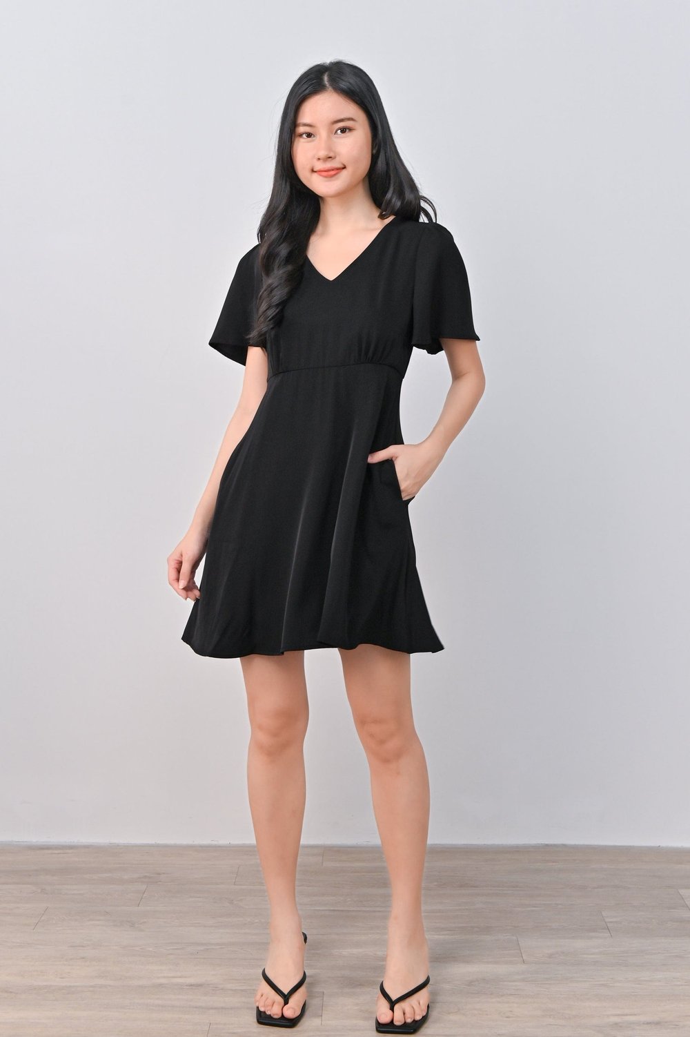 DONELLA V-NECK DRESS-ROMPER IN BLACK DONELLA V-NECK DRESS-ROMPER IN BLACK