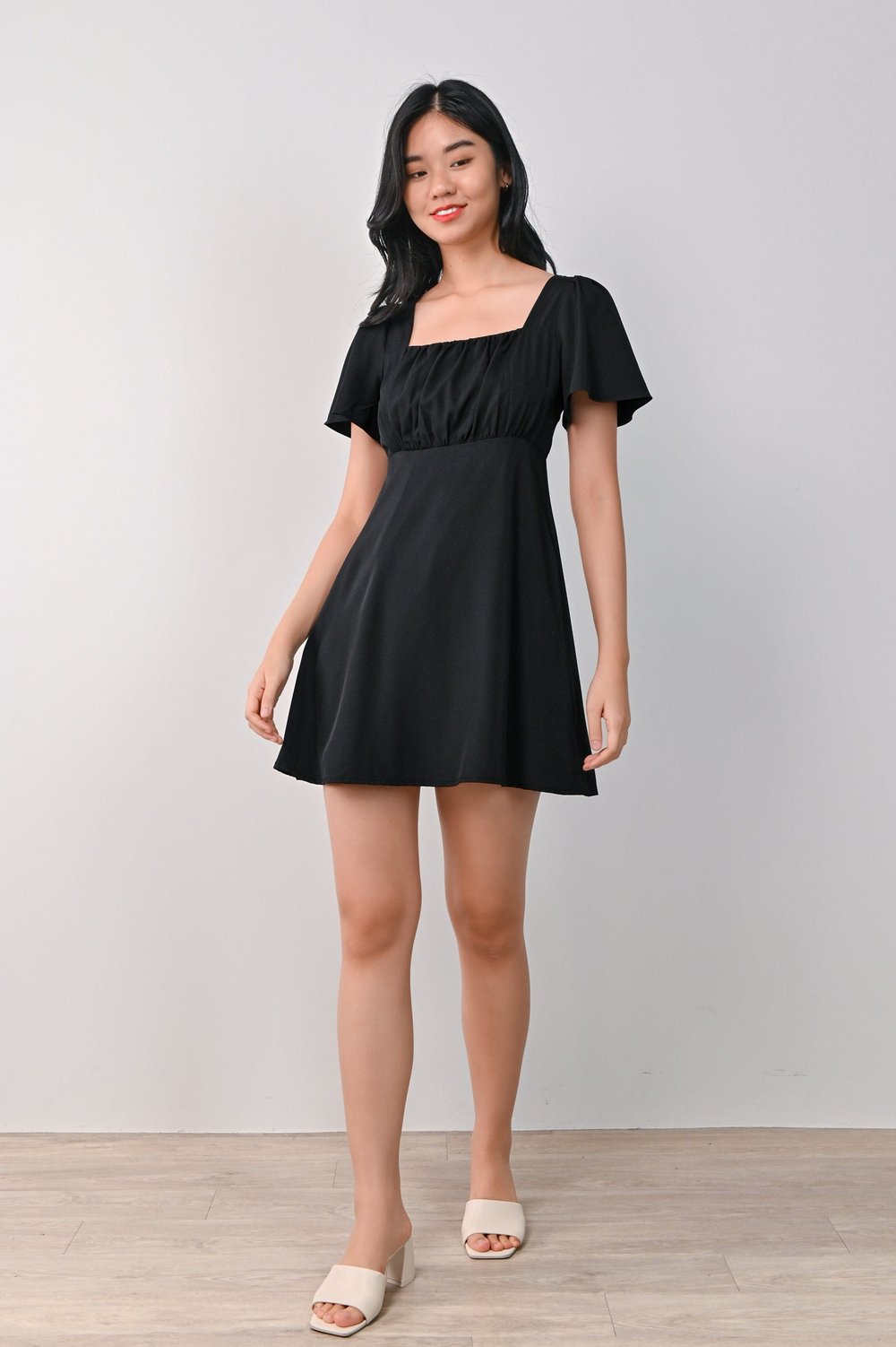 MARENE RUCHED DRESS-ROMPER IN BLACK