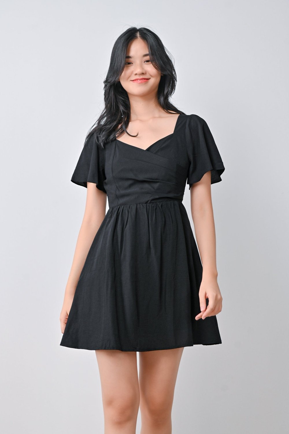REGINE PLEAT DRESS-ROMPER IN BLACK