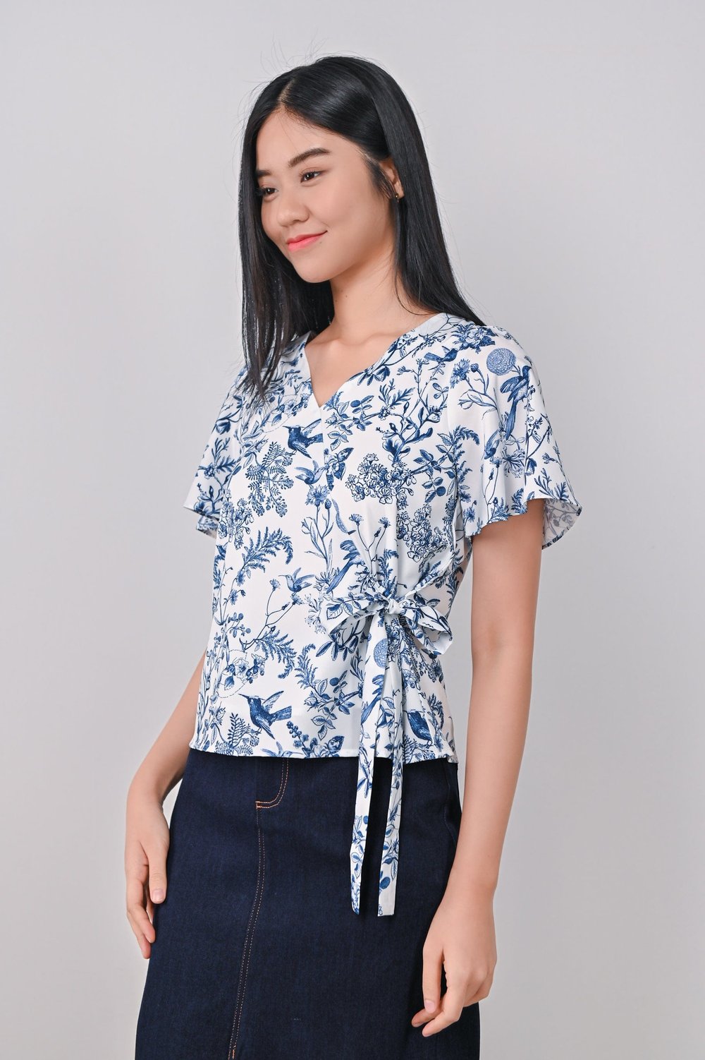 NAVY HUMMINGBIRD FAUX-WRAP TOP NAVY HUMMINGBIRD FAUX-WRAP TOP