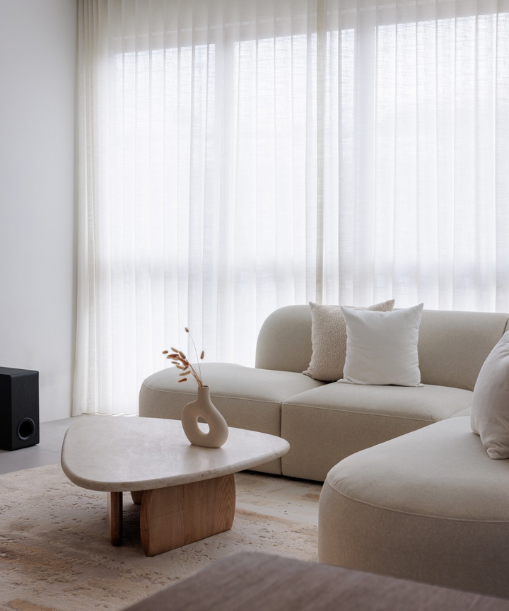 Calliope Travertine Coffee Table - Rounded Triangle Calliope Travertine Coffee Table - Rounded Triangle