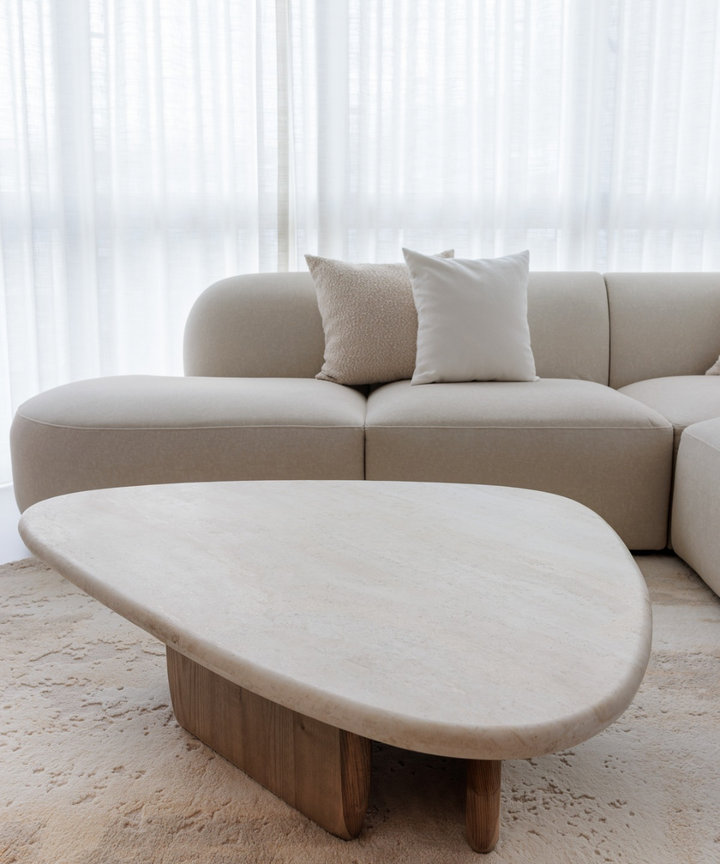 Calliope Travertine Coffee Table - Rounded Triangle Calliope Travertine Coffee Table - Rounded Triangle